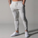 2020 JP&UK Mens Sweatpants Gym Jogging Pants Fitness Bodybuilding Joggers Workout Trousers Slim Men Casual Cotton Pencil Pants